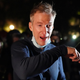 Portland Mayor Ted Wheeler reacts after being exposed to tear gas fired by federal officers while attending a protest against police brutality and racial injustice in front of the Mark O. Hatfield U.S. Courthouse on July 22, 2020, in Portland, Ore.